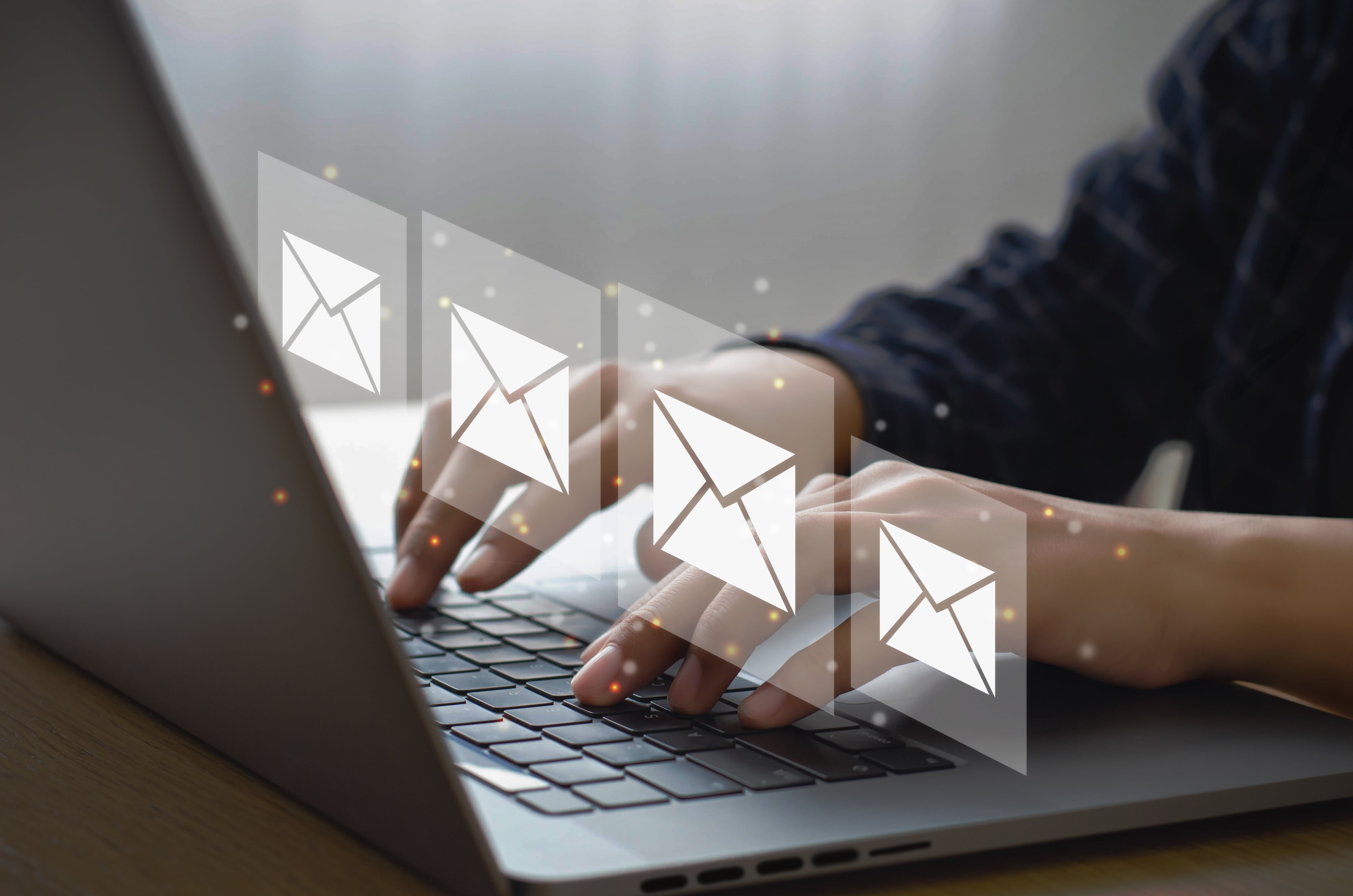 Person at a laptop checking Informed Delivery notifications